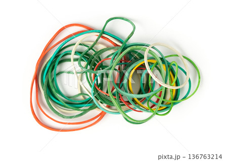 Rubber band isolated. Elastic rubberband bracelets pile, plastic flexibility circles Rubber band isolated. Elastic rubberband bracelets pile, plastic flexibility circles 136763214