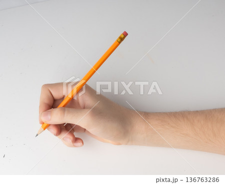 Eraser on paper. Erasing what was written, deleting an error, correcting mistake Eraser on paper. Erasing what was written, deleting an error, correcting mistake 136763286