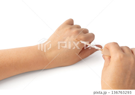 Foundation cream smear isolated. Cosmetic concealer textured swatch, skin tone cream 136763293