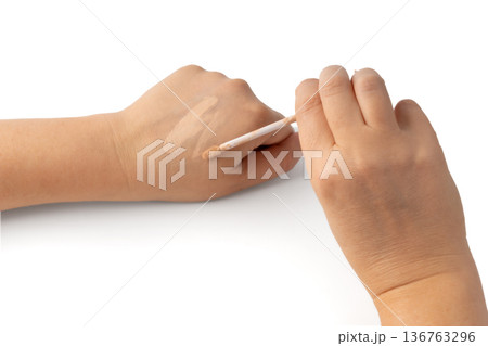 Foundation cream smear isolated. Cosmetic concealer textured swatch, skin tone cream Foundation cream smear isolated. Cosmetic concealer textured swatch, skin tone cream 136763296