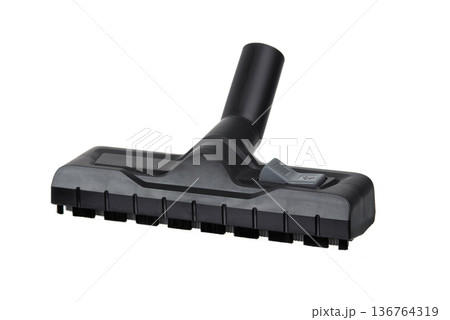 Vacuum cleaner floor brush head isolated on white background, household cleaning accessory with bristles and plastic nozzle. Vacuum cleaner floor brush head isolated on white background, household cleaning accessory with bristles and plastic nozzle. 136764319