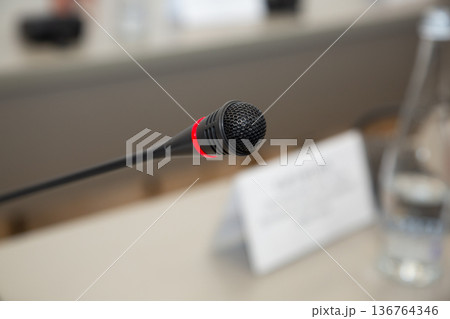 Close up microphone in meeting room Close up microphone in meeting room 136764346