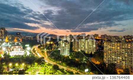 Amazing Aerial view on sunset in Tbilisi ; right side Saburtalo district, left side -Vake Amazing Aerial view on sunset in Tbilisi ; right side Saburtalo district, left side -Vake 136764408