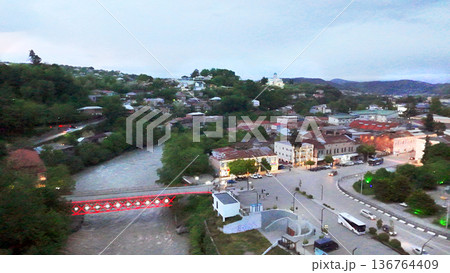 Sunset view aerial on Kutaisi with town square (white bus to airport) Sunset view aerial on Kutaisi with town square (white bus to airport) 136764409