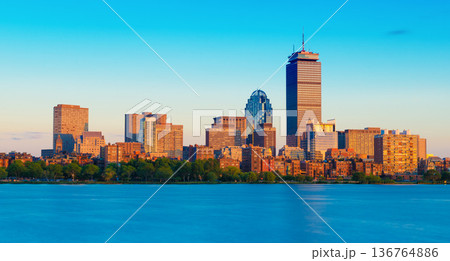 Evening panorama of Boston, cityscape viewed from Cambridge across the Charles River, Massachusetts, USA Evening panorama of Boston, cityscape viewed from Cambridge across the Charles River, Massachusetts, USA 136764886