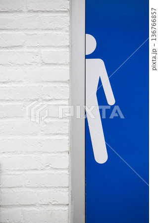 Male toilet restroom symbol on a wall Male toilet restroom symbol on a wall 136766857