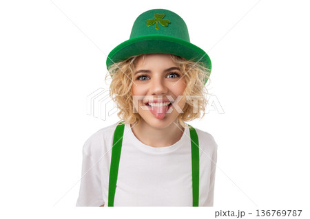 Blonde woman in a green hat celebrates St. Patrick's, isolated, PNG 136769787