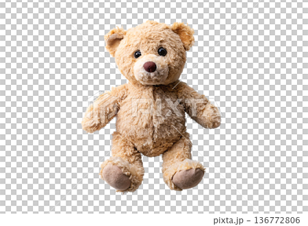 Worn teddy bear with torn chest showing stuffing damage and wear 136772806