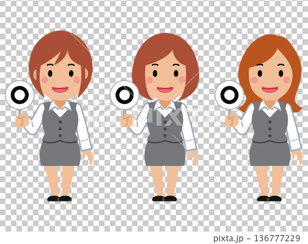A young woman in gray office wear holding up the correct answer card A young woman in gray office wear holding up the correct answer card 136777229