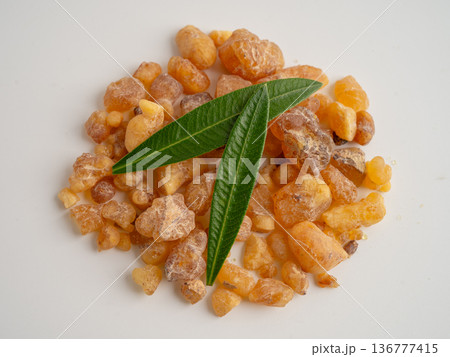 Frankincense or olibanum aromatic resin isolated on white background used in incense and perfumes. 136777415