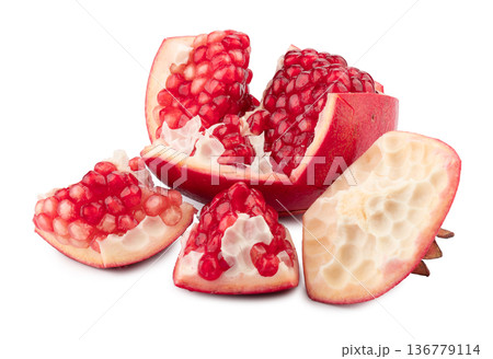 Ripe pomegranate fruit isolated on white background Ripe pomegranate fruit isolated on white background 136779114