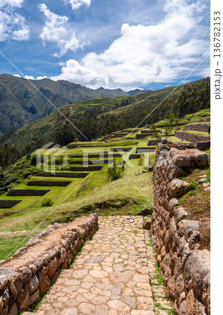Inca archaeological site of Chinchero with terraces and mountain backdrop Inca archaeological site of Chinchero with terraces and mountain backdrop 136782153