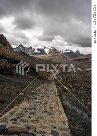 Stone trail leading to Pastoruri Glacier, Huaraz, Peru, amidst rugged mountains 136782155