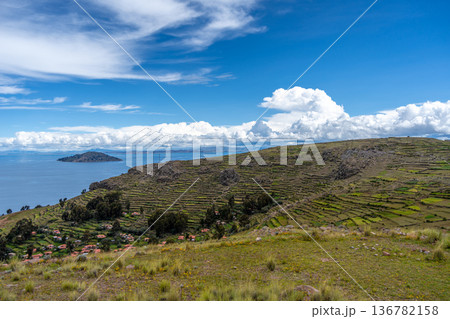 Terraced fields on Amantani Island overlooking Lake Titicaca, Peru Terraced fields on Amantani Island overlooking Lake Titicaca, Peru 136782158