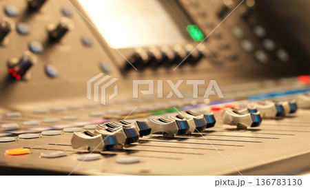 Mixing Console Faders In Focus, Control Panel Stays Idle. Studio Background, Modern Audio Technology. Mixing Console Faders In Focus, Control Panel Stays Idle. Studio Background, Modern Audio Technology. 136783130