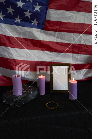 funeral an American hero, photo frame, candles, marble urn for ashes, holy bible and spiritual bracelet with black cross funeral an American hero, photo frame, candles, marble urn for ashes, holy bible and spiritual bracelet with black cross 136783146