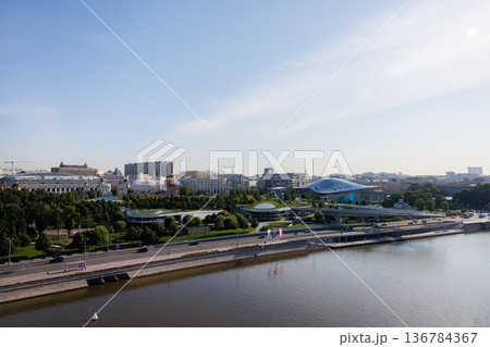 View of a vibrant urban park along the riverbank in Moscow on a sunny day 136784367
