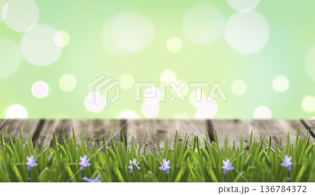 Empty wooden table with green bokeh light background. Easter or spring, party background, Empty wooden table with green bokeh light background. Easter or spring, party background, 136784372