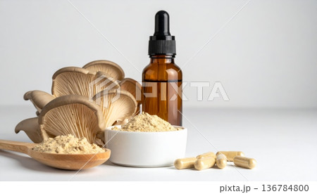 Fresh organic garlic and herbal olive oil in a glass bottle create a natural wellness still life for aromatherapy, massage, and healthy food treatment Fresh organic garlic and herbal olive oil in a glass bottle create a natural wellness still life for aromatherapy, massage, and healthy food treatment 136784800