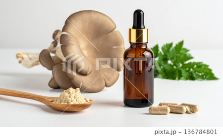 Fresh organic garlic and herbal olive oil in a glass bottle create a natural wellness still life for aromatherapy, massage, and healthy food treatment Fresh organic garlic and herbal olive oil in a glass bottle create a natural wellness still life for aromatherapy, massage, and healthy food treatment 136784801