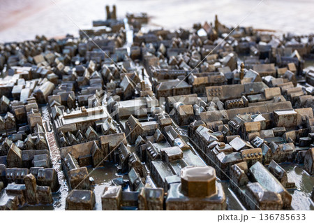 3D sculpture of the Memmingen city in Germany. The model showcases detailed buildings, streets, and landmarks, representing the city's architecture and layout. 136785633
