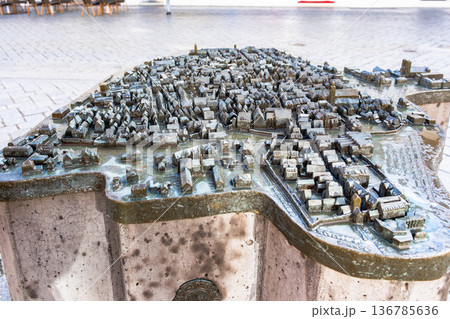 3D sculpture of the Memmingen city in Germany. The model showcases detailed buildings, streets, and landmarks, representing the city's architecture and layout. 136785636