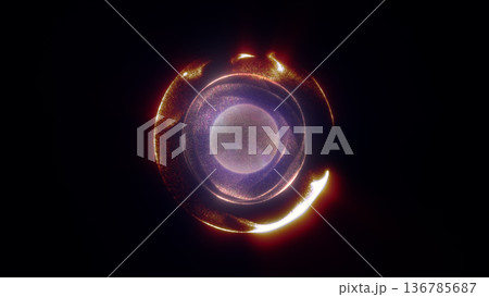 Glowing amber energy sphere with luminous rings and sparkling particles on a dark background 136785687
