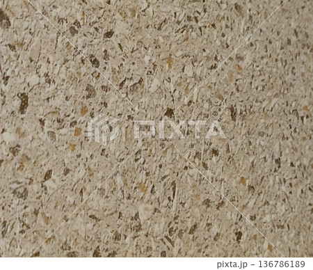 Detailed beige terrazzo texture. Ideal for backgrounds, interior design, architecture, and creative projects. Its neutral tone provides a versatile and sophisticated touch to any design application. 136786189