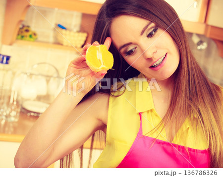 Female cook holding fruit. Female cook holding fruit. 136786326