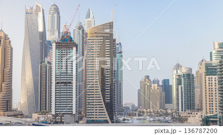 Amazing colorful dubai marina skyline during sunset timelapse 136787200