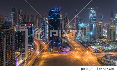Dubai business bay towers night timelapse aerial 136787386