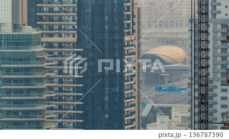 Amazing colorful dubai marina skyline during sunset timelapse 136787390