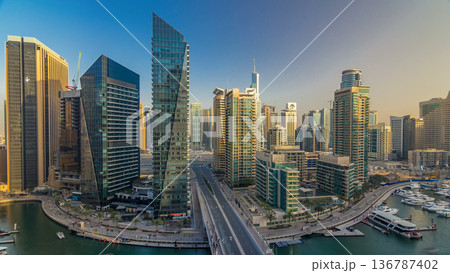 Amazing colorful dubai marina skyline during sunset timelapse 136787402