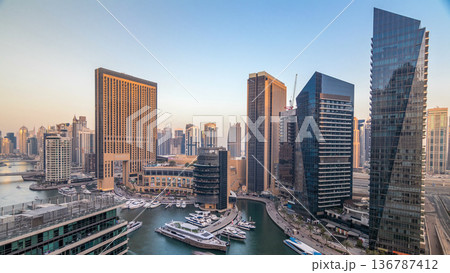 Amazing colorful dubai marina skyline during sunset timelapse 136787412