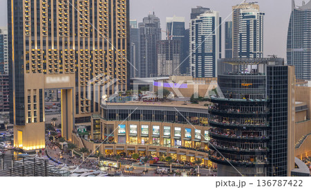 Beautiful aerial top view day to night transition timelapse of Dubai Marina canal Beautiful aerial top view day to night transition timelapse of Dubai Marina canal 136787422