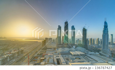 Dubai downtown with sunrise timelapse. Top view from above 136787427