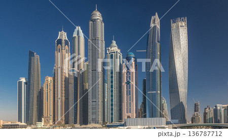 Scenic view of Dubai Marina Skyscrapers with boats timelapse, Skyline, View from sea, United Arab Emirates 136787712