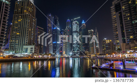 Dubai marina bay with yachts an boats night timelapse hyperlapse Dubai marina bay with yachts an boats night timelapse hyperlapse 136787730