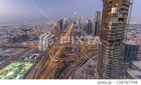 Scenic Dubai downtown skyline day to night timelapse. Rooftop view of Sheikh Zayed road Scenic Dubai downtown skyline day to night timelapse. Rooftop view of Sheikh Zayed road 136787748