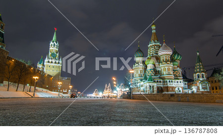 Moscow Kremlin timelapse hyperlapse with Spasskaya tower and Cathedral of St. Basil, Russia. Red Square in winter night Moscow Kremlin timelapse hyperlapse with Spasskaya tower and Cathedral of St. Basil, Russia. Red Square in winter night 136787808