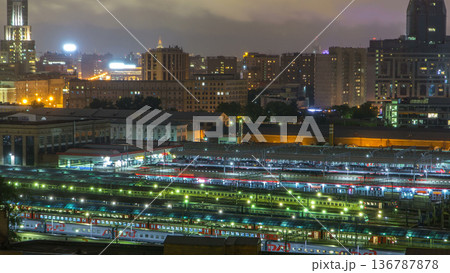 Evening top view of three railway stations night timelapse at the Komsomolskaya square in Moscow, Russia 136787878