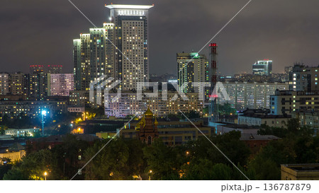 Night Moscow cityscape from rooftop timelapse. Residential buildings at night. Night view from the roof Night Moscow cityscape from rooftop timelapse. Residential buildings at night. Night view from the roof 136787879