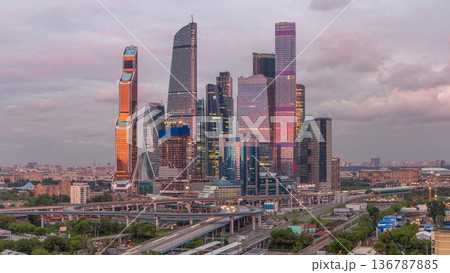 Business complex of skyscrapers Moscow city day to night timelapse. Business complex of skyscrapers Moscow city day to night timelapse. 136787885