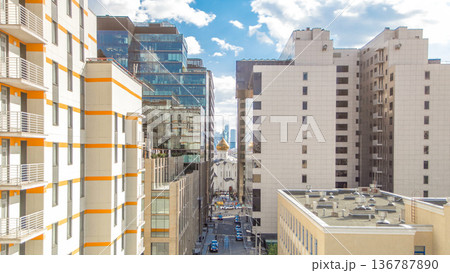 Temple of St. Nicholas timelapse in Tverskaya Zastava between office buildings in Moscow, Russia Temple of St. Nicholas timelapse in Tverskaya Zastava between office buildings in Moscow, Russia 136787890