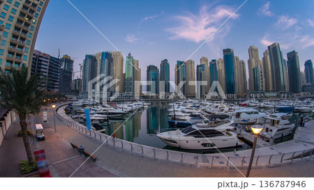 Dubai Marina at Blue hour night to day timelapse with yachts Dubai Marina at Blue hour night to day timelapse with yachts 136787946