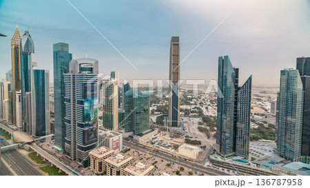 Dubai skyline timelapse at sunset with city center skyscrapers and Sheikh Zayed road traffic, Dubai, United Arab Emirates 136787958