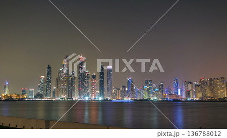 Dubai Marina skyline day to night timelapse as seen from Palm Jumeirah in Dubai, UAE. 136788012