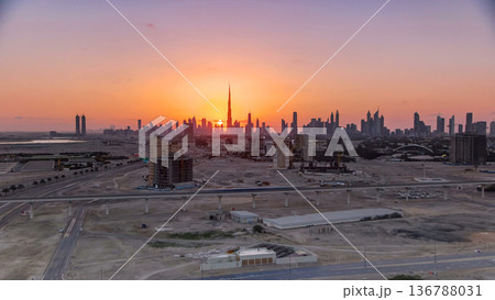 Sunset with skyline of Downtown Dubai in the evening timelapse. 136788031