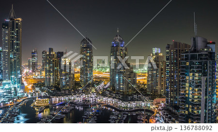 Aerial top view at night timelapse of Dubai Marina in Dubai, UAE Aerial top view at night timelapse of Dubai Marina in Dubai, UAE 136788092
