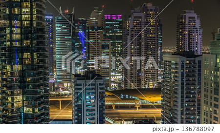 Aerial top view at night timelapse of Dubai Marina in Dubai, UAE Aerial top view at night timelapse of Dubai Marina in Dubai, UAE 136788097